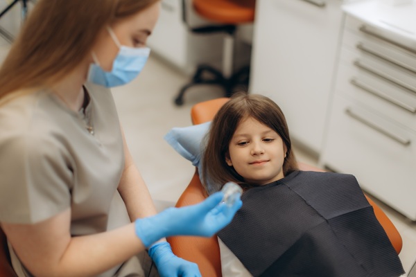 Should I Take My Child To A Kid Friendly Dentist In Los Angeles For White Spots On Teeth?